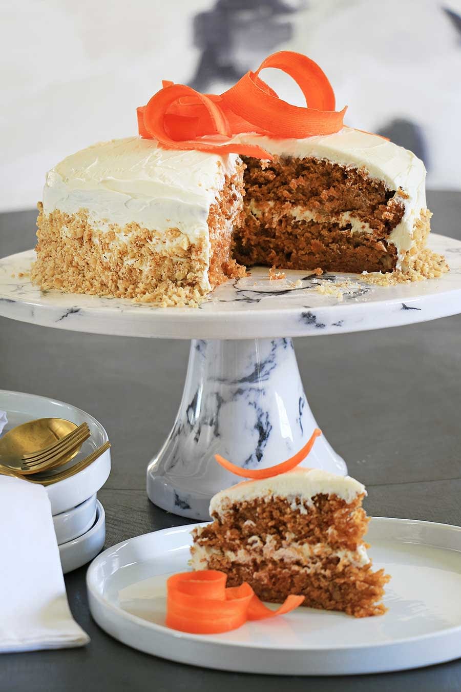 Vegan carrot cake with a slice